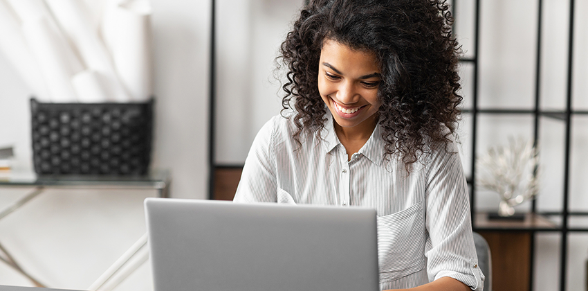 woman sending a job interview thank you email